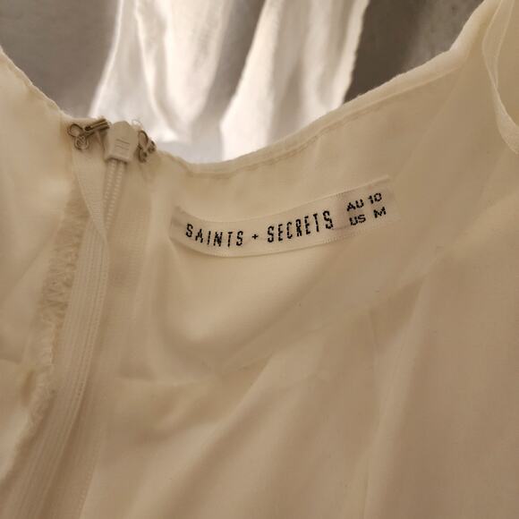 Saints + Secrets Puff Sleeve Open Back Bow White Ruffle Dress - Picture 5 of 9